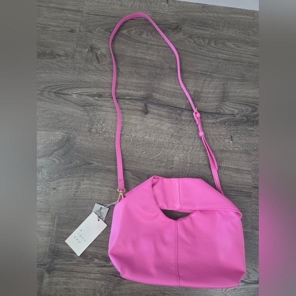 a new day Handbags - A New Day Pink Twist Crossbody Bag NWT